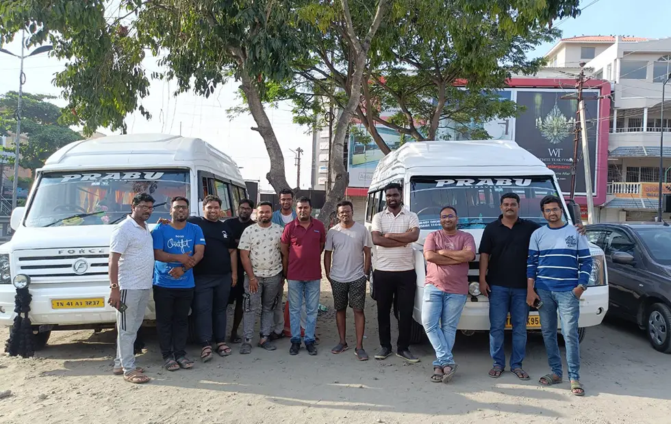 Corporate team travelling together in a tempo traveller booked from Coimbatore